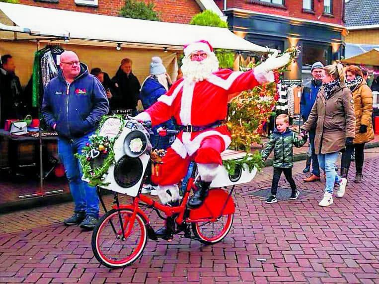 Fietsende Kerstman te boeken bij www.kerst-entertainment.nl